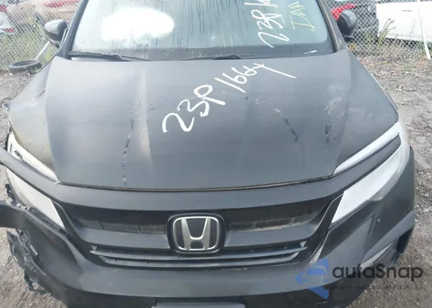 2021 Honda Pilot Awd Touring 7 Passenger z USA, uszkodzony, nr VIN 5FNYF6H64MB084120